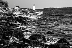 Waves Break Along Rocky Shoreline by Portsmouth Light -BW
